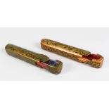 A PAIR OF 19TH CENTURY INDO PERSIAN QALAMDAN PAPIER MACHE PEN BOXES, 20cm long.