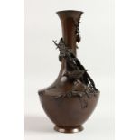 A VERY GOOD JAPANESE MEIJI PERIOD BRONZE VASE with applied decoration, a bird, a branch and flowers.