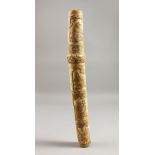 A GOOD JAPANESE CARVED IVORY TANTO, carved with monkeys. 15ins long.