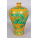A CHINESE MING STYLE YELLOW & GREEN PORCELAIN MEIPING DRAGON VASE, the base with a six-character