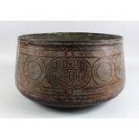 A 15TH CENTURY MUMLUK COPPER BOWL PROBABLY DAMASCUS with calligraphy on the sides, 39cm diameter,