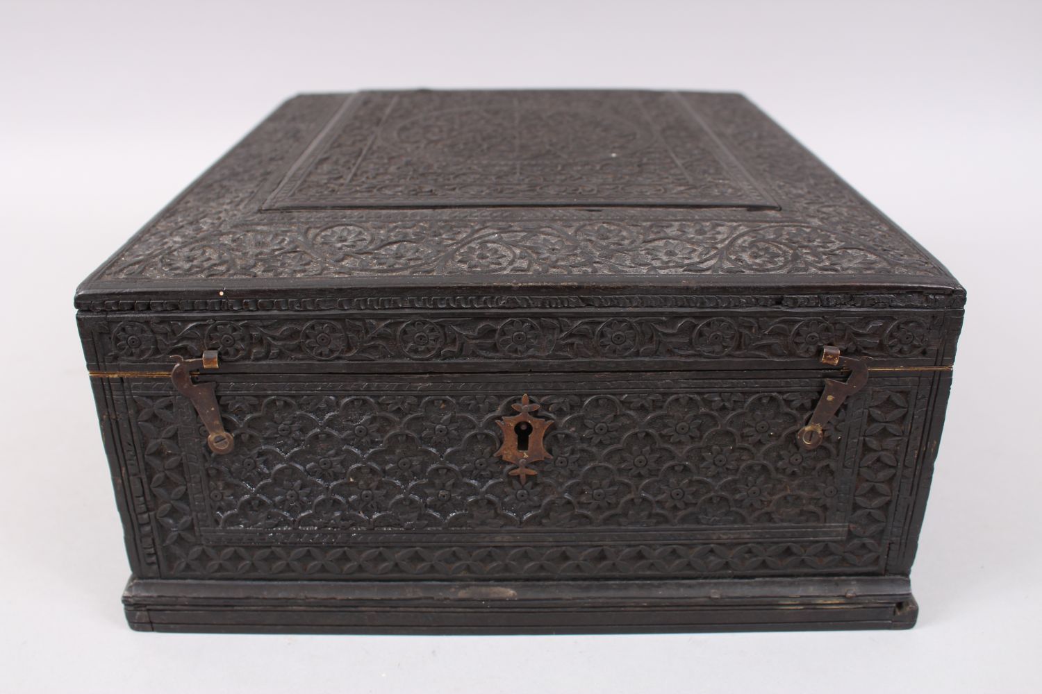 A 19TH CENTURY NORTH INDIAN CARVED EBONY JEWELLERY BOX with hinged lid and fitted interior, 30cm - Image 2 of 6