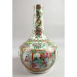 A GOOD 19TH CENTURY CANTON ENAMEL BOTTLE VASE, painted with flowers, birds and insects. 13.5ins