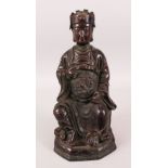 A GOOD CHINESE 19TH / 20TH CENTURY BRONZE FIGURE OF A SEATED EMPEROR, the bronze modeled seated with