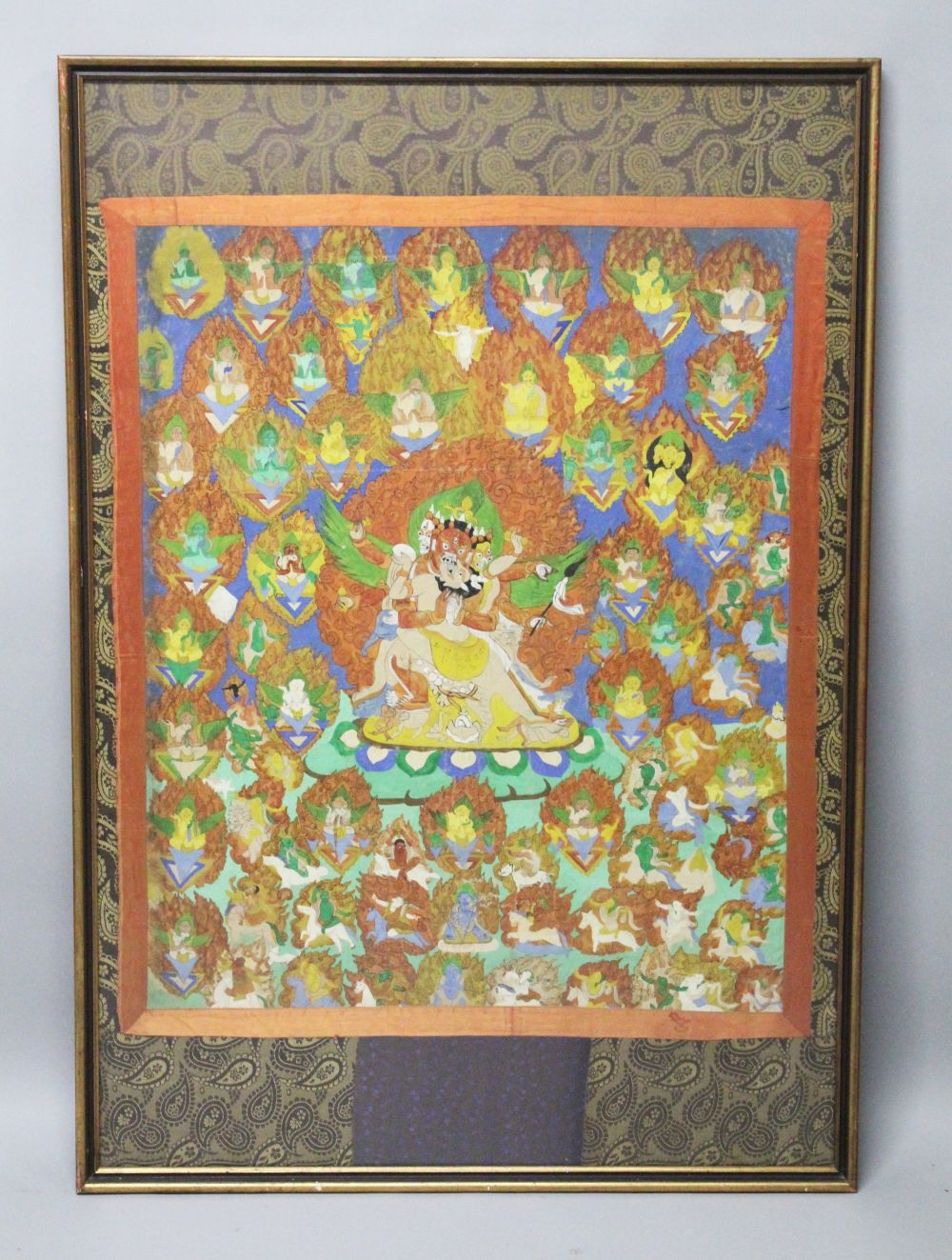 A 19TH-20TH CENTURY FRAMED INDIAN PAINTING ON TEXTILE OF BRAHMA, depicting a central three headed