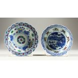 TWO CHINESE CIRCULAR COLUMN BLUE AND WHITE BOWLS with six character mark. 5ins diameter. 212.