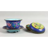 A BLUE CLOISONNE ENAMEL BOX AND COVER, 4ins diameter and a BLUE ENAMEL BOWL AND STAND (3).
