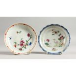 TWO SMALL CHINESE FAMILLE ROSE SAUCERS. 4.75ins diameter.