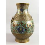 A GOOD 19TH CENTURY CHINESE CLOISONNE VASE with ring handles. 14.5ins high.