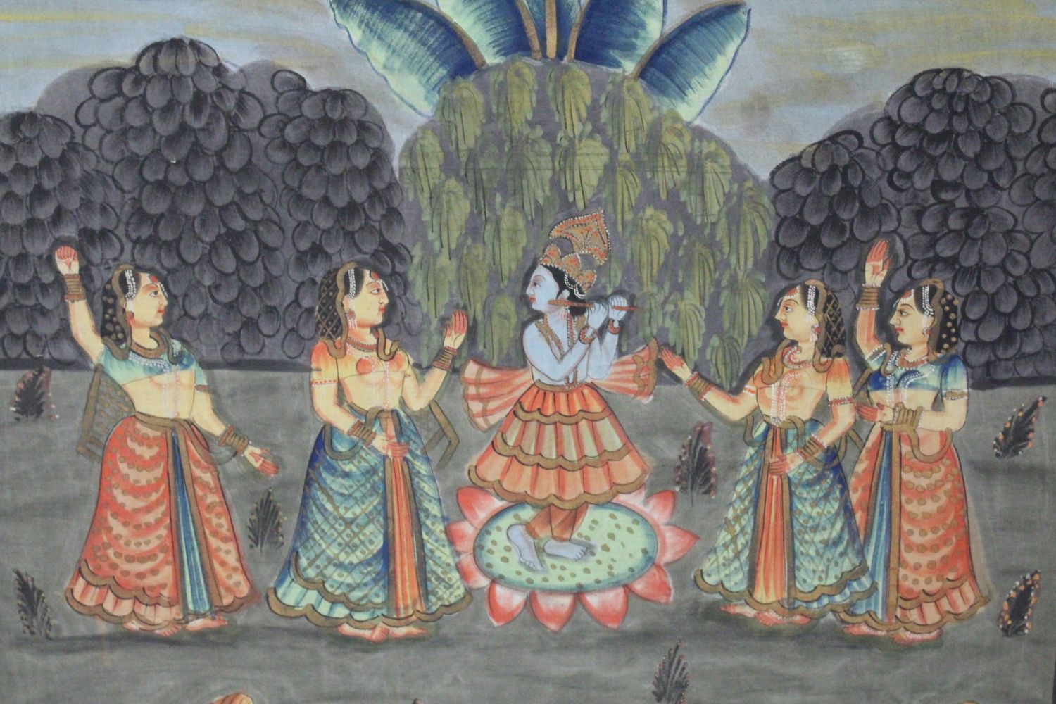 A 19TH-20TH CENTURY FRAMED INDIAN PAINTING ON TEXTILE depicting a blue skin god playing an - Image 2 of 2