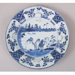 A CHINESE KANGXI PERIOD BLUE & WHITE PORCELAIN PLATE, circa 1700, of larger than average size,