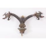 A 17TH - 18TH CENTURY PERSIAN SAFAVID ENGRAVED BRASS OR BRONZE TWIN DRAGON HEADED STANDARD FINIAL.