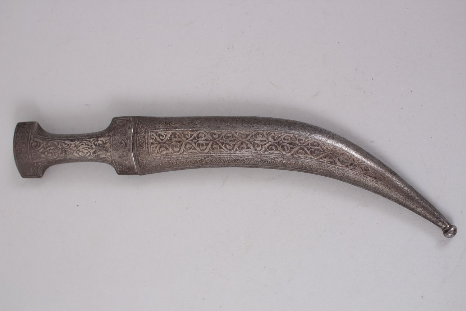 A 19TH CENTURY PERSIAN DAGGER with watered steel blade and silver inlaid sheath, 35cm long. - Image 4 of 4