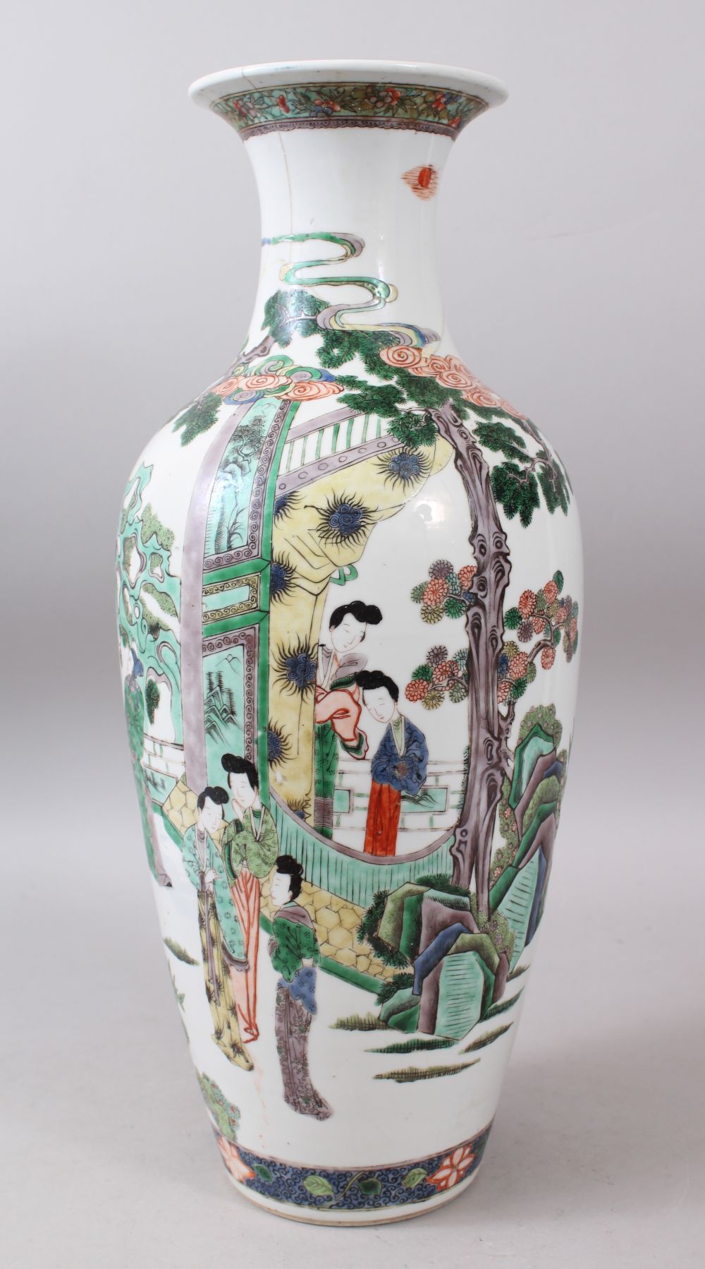 A LARGE CHINESE KANGXI PERIOD FAMILLE VERTE VASE Circa 1700, painted with various figures, trees