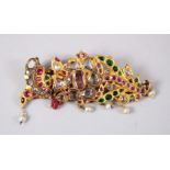 AN 18TH-19TH CENTURY PERSIAN TURBAN CLIP / BROOCH set with diamonds, rubies and emeralds.