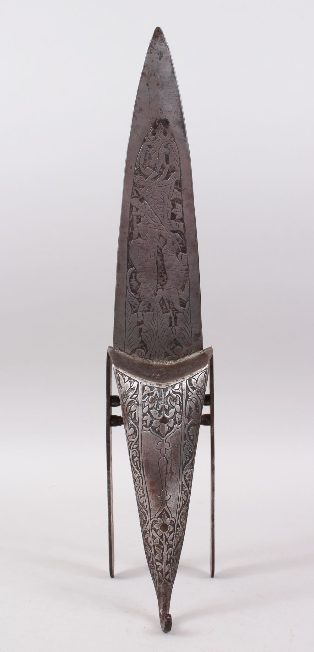 A LARGE 19TH CENTURY SOUTH INDIAN ENGRAVED STEEL HOODED KATAR, 52cm long.