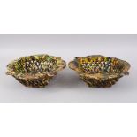 A RARE PAIR OF 19TH CENTURY TURKISH OTTOMAN CANAKKALE POTTERY PIERCED YELLOW GROUND BASKETS, 25cm