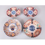TWO JAPANESE MEIJI PERIOD IMARI PORCELAIN PLATES, together with two Japanese imari oval porcelain