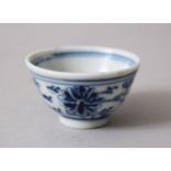 A CHINESE GUANGXU MARK & PERIOD PORCELAIN WINE CUP, the sides painted with formal scrolling lotus,