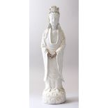 A LARGE 18TH / 19TH CENTURY CHINESE BLANC DE CHINE FIGURE OF GUANYIN, 43cm high x 10.4cm wide.