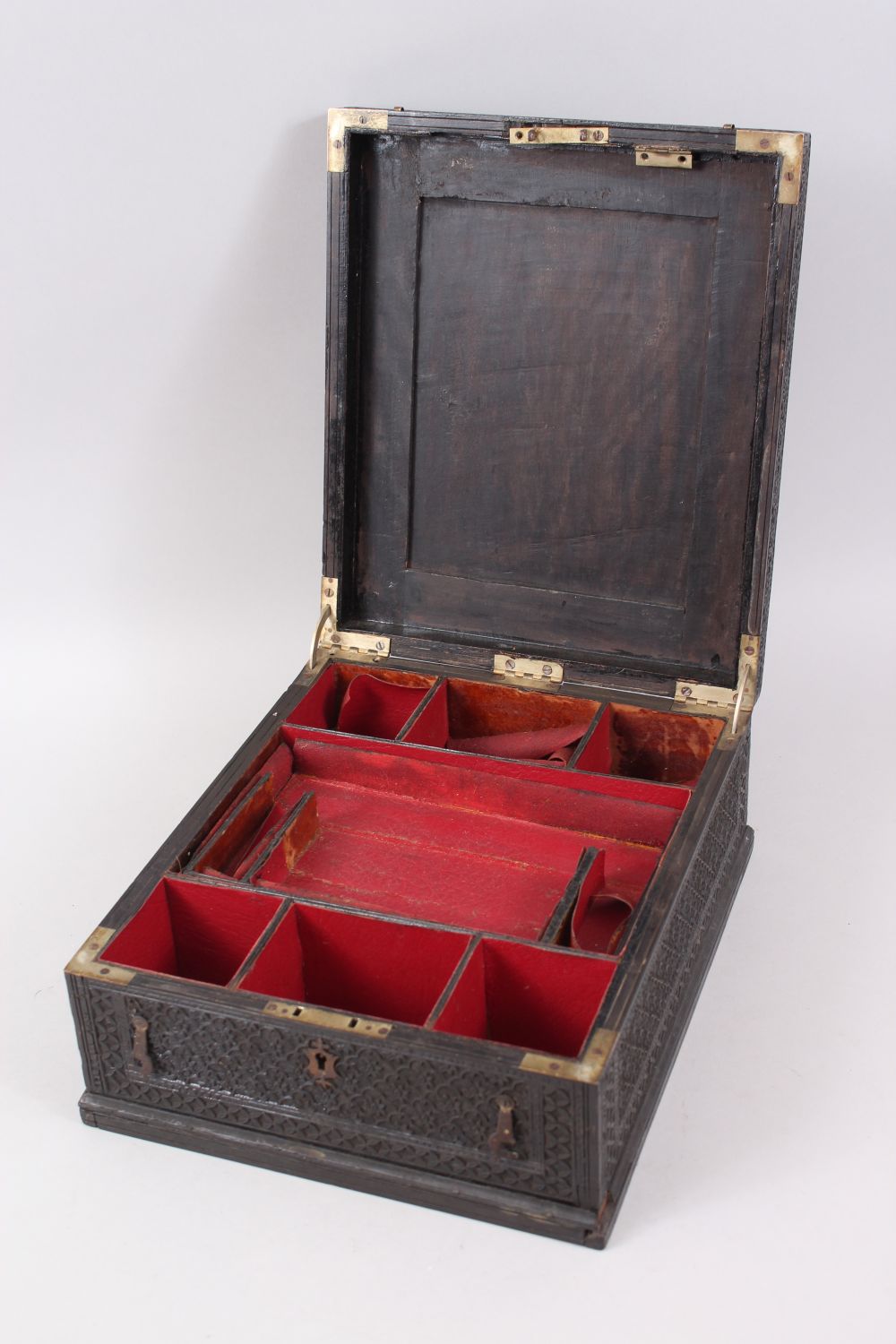 A 19TH CENTURY NORTH INDIAN CARVED EBONY JEWELLERY BOX with hinged lid and fitted interior, 30cm - Image 5 of 6