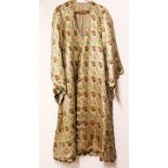 A VERY FINE, POSSIBLY PERSIAN, GOLD THREADED SILK COAT.