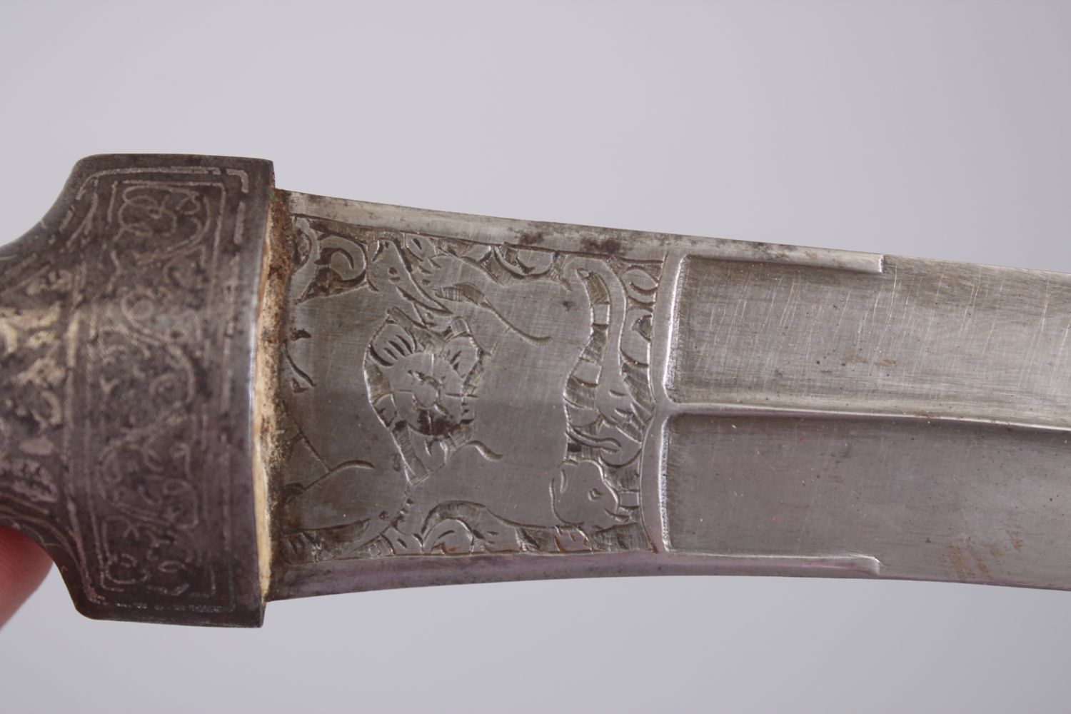 A 19TH CENTURY PERSIAN DAGGER with watered steel blade and silver inlaid sheath, 35cm long. - Image 2 of 4