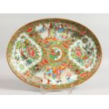 A CANTON OVAL DISH with four panels of birds, butterflies and flowers. 11.5ins wide.