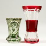 A BOHEMIAN GREEN BEAKER, engraved with deer and ducks, 5.5ins high, and A RUBY TINTED VASE, 8ins