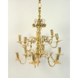 A GOOD 18TH CENTURY STYLE BRASS TWELVE BRANCH CHANDELIER, with hanging chain. Chandelier: 50cms