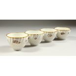 A SET OF FOUR WORCESTER GILDED SPIRAL PATTERN BOWLS.