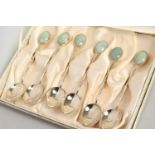 A SET OF SIX SILVER AND JADE TEASPOONS.