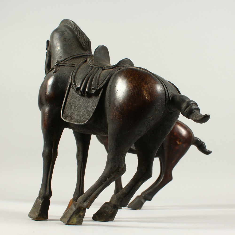 A PAIR OF BRONZE TANG STYE STANDING HORSES. 29cms high. - Image 5 of 6