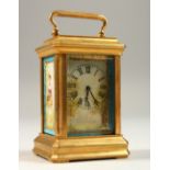 A MINIATURE SEVRES STYLE CARRIAGE CLOCK. 8cms high.