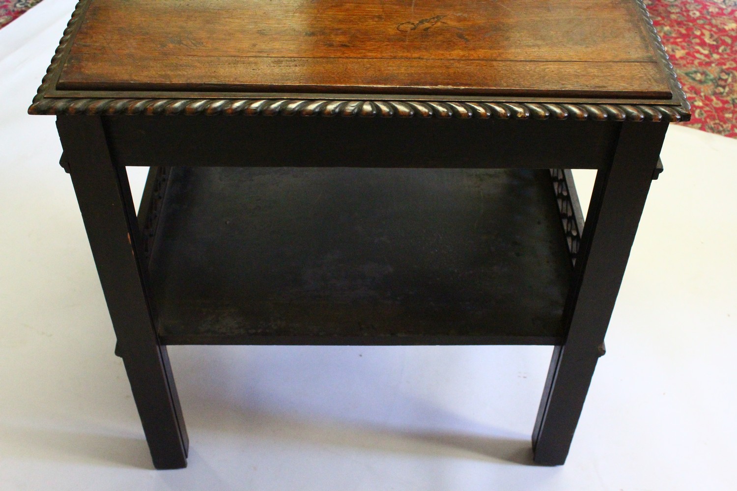 A CHIPPENDALE REVIVAL TWO-TIER MAHOGANY TABLE, with gadrooned edge, blind fret frieze, galleried - Image 6 of 7