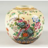A SMALL GINGER JAR, decorated with birds and flowers (no cover). 12cms high.