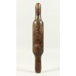 AN EARLY WOODEN ROLLING PIN. 29cms long.