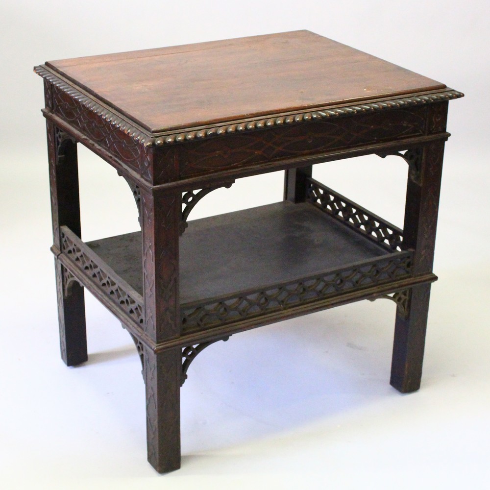 A CHIPPENDALE REVIVAL TWO-TIER MAHOGANY TABLE, with gadrooned edge, blind fret frieze, galleried