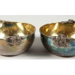 TWO .925 HAMMERED SILVER BOWLS, with fruiting vine handles, 6ins diameter, engraved Modena Cento Ore