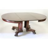 AN UNUSUAL MAHOGANY EXTENDING DINING TABLE, EARLY 20TH CENTURY, the rounded top, column and base