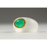 AN UNUSUAL CRYSTAL RING, inset with a green stone.
