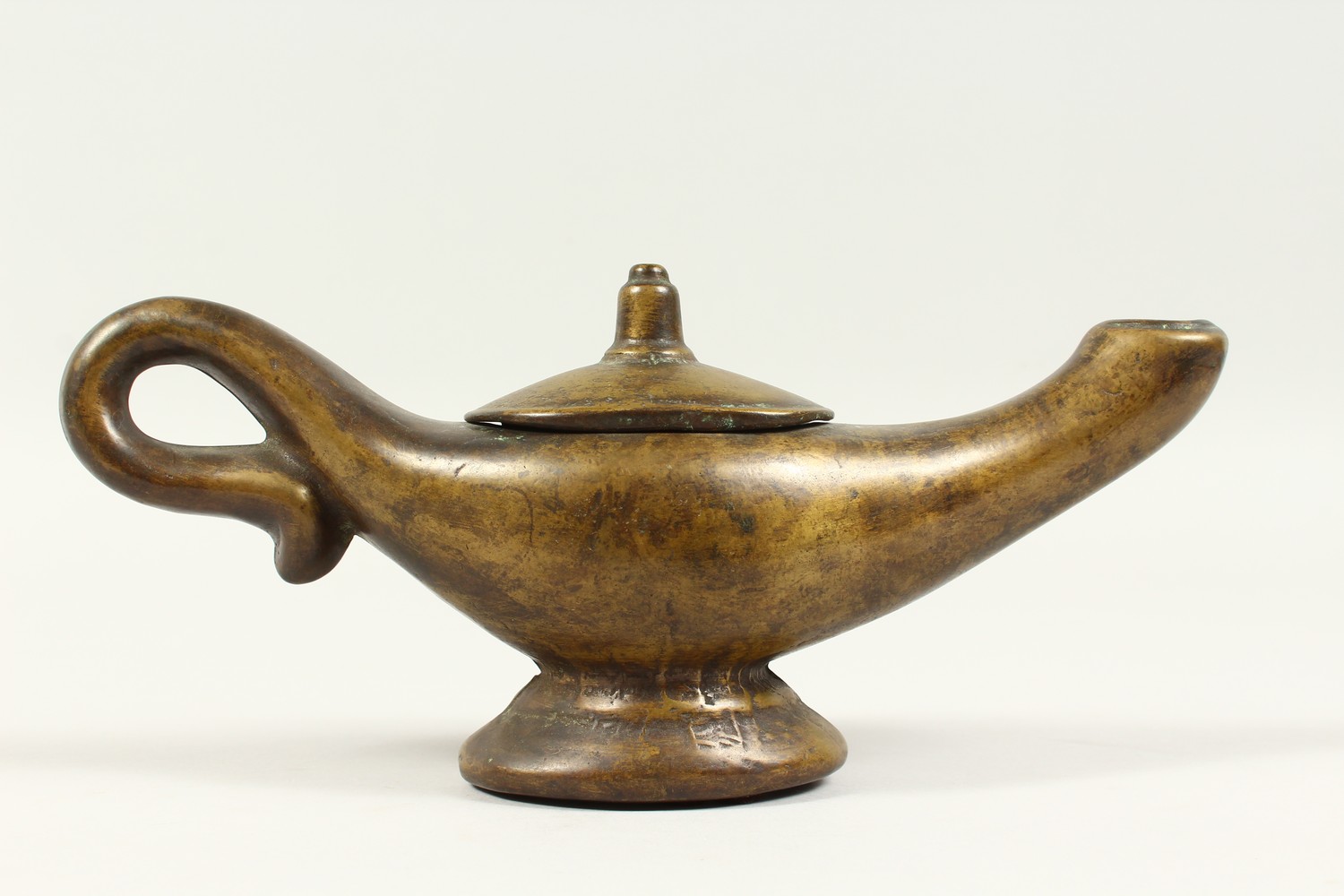 A BRONZE "ALADDINS LAMP" JUG. 28cms long. - Image 2 of 6