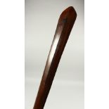 A POLYNESIAN CARVED WOOD CLUB, of broad spear tip design. 130cms long.