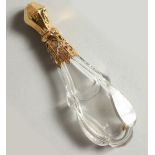 A GOOD OVAL CRYSTAL SCENT BOTTLE, with gold top and glass stopper.