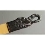 A LETTER OPENER, with Russian silver handle modelled as an elephant head. 25.5cms long.
