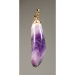 A GOLD MOUNTED AMETHYST PENDANT.