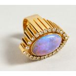 A VERY GOOD 18CT GOLD, OPAL AND DIAMOND RING. Maker R. H.