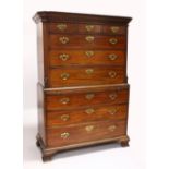 A GEORGE III MAHOGANY CHEST ON CHEST, with moulded cornice, three small drawers, three graduated