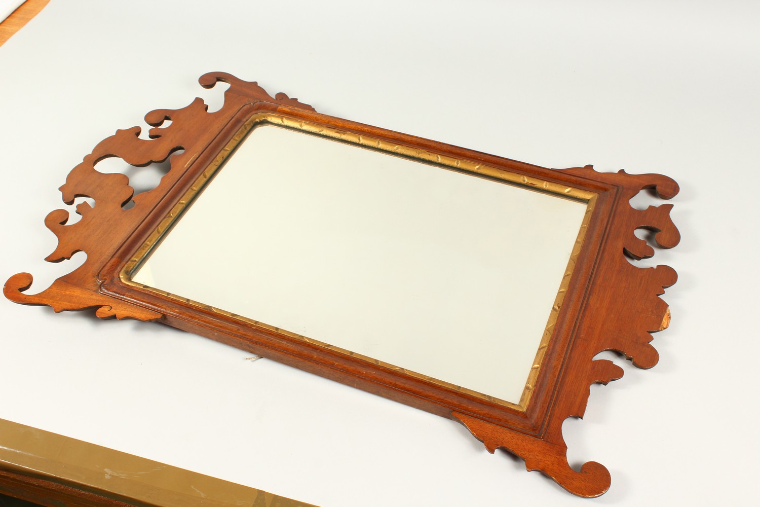 A GEORGE III STYLE MAHOGANY FRETWORK FRAMED WALL MIRROR. 70cms high x 44cms wide. - Image 2 of 8