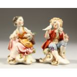 A PAIR OF CAPODIMONTE FIGURES OF A BOY AND GIRL. 12cms high.